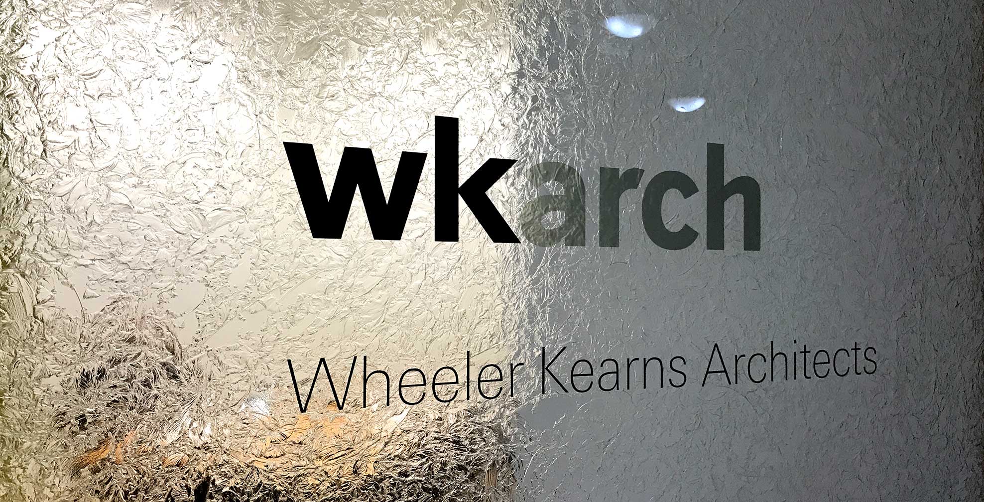 wkarch_door-sign.jpg Art Direction by: Bart Crosby, Crosby Associates